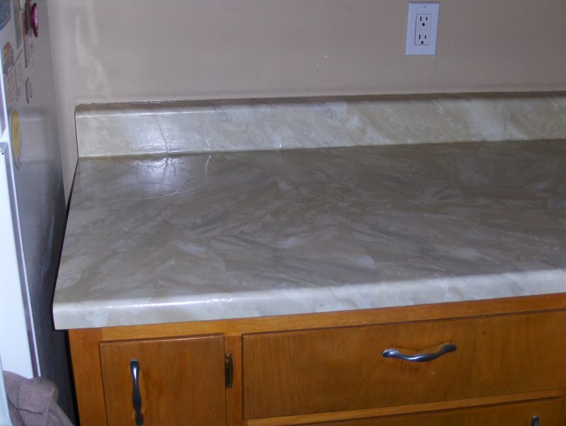 Kitchen countertop resurfaced with PaperIllusion Travertine French Vanilla