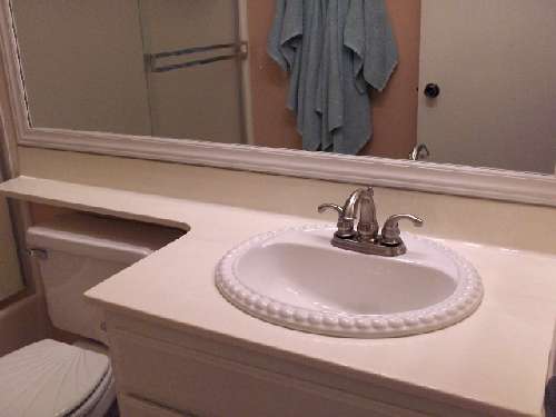 Bathroom countertop resurfaced with PaperIllusion Florentine Marble Stone