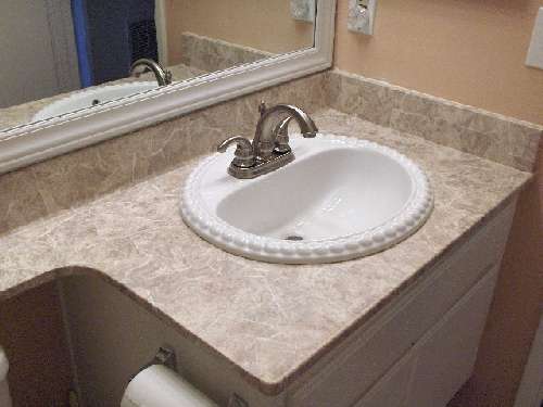 Bathroom countertop resurfaced with PaperIllusion Florentine Marble Stone