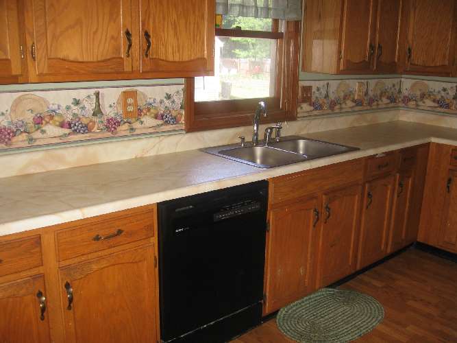 Kitchen countertop resurfaced with PaperIllusion Hearthstone Camouflage