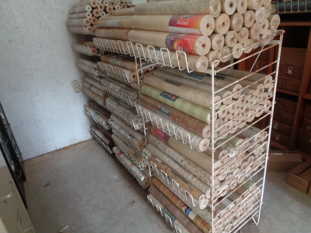 Racks of wallpaper rolls